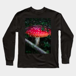 Bright red magical mushroom with white spots deep in the forest Long Sleeve T-Shirt